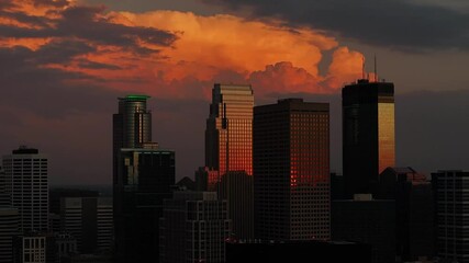 Wall Mural - Drone footage of a beautiful skyline with clouds during sunset in the summer