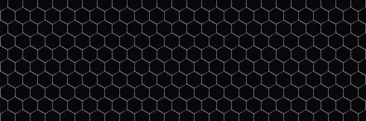 Wall Mural - dark grey abstract wide horizontal banner with hexagon carbon fiber grid and orange luminous lines. 
