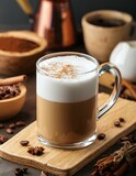 café crème avec de la mousse, cappuccino dans une tasse en verre sur une table aux éléments gourmands en ia