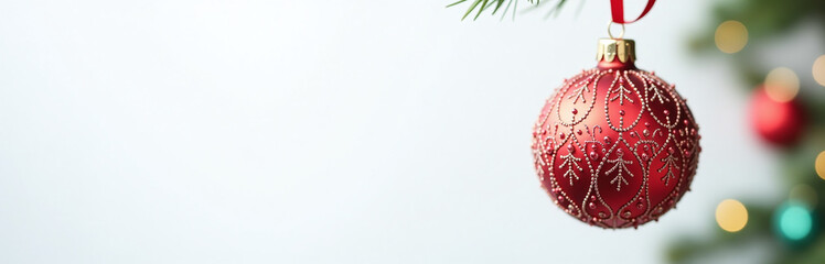Poster - Colorful Christmas Ornament Hanging From A Ribbon Isolated Against A Clean White Background With Soft Focus Effect Still Life. 00002