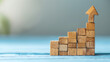 © Wisarut Official - Growth strategy wooden blocks charting progress minimalist workspace conceptual visualization