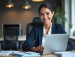 © Trascot - portrait of a businesswoman working on her laptop