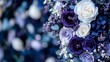 © Yuliia - Romantic floral arrangement featuring deep purple and white roses with delicate baby's breath against dark blue background, creating dramatic contrast and mood.