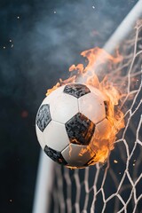 Wall Mural - A soccer ball is on fire and is on a net. Concept of danger and excitement