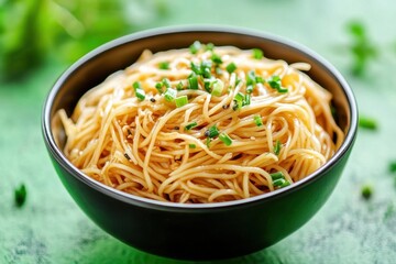 Canvas Print - Delicious looking bowl of Asian noodles with green onions