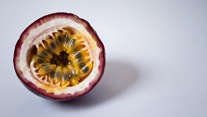 Wall Mural - Half a passion fruit on a white background