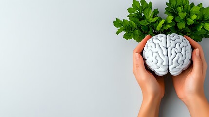 Poster - Hands holding white brain model with green parsley leaves above on light background. Mental health, neurology and brain function concept for medical design.