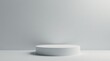 © Sumrit - Simple White Cylinder Platform on a Light Grey Background for Product Display or Presentation