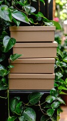 Stacked cardboard boxes among lush greenery