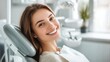 © Iaroslav - Young woman radiating confidence with a perfect smile after completing a dental checkup at the dentist's clinic, showcasing oral health