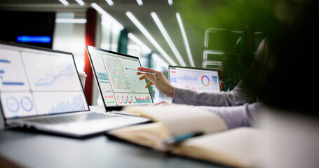 Aufkleber - Young woman managing financial data on laptop