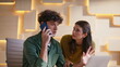 © stockbusters - Tensed colleagues calling cellphone at workplace closeup. Frustrated coworkers