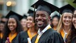 © miss irine - International students in mortar boards, bachelor gowns celebrate graduation. Multicultural crowd of happy young graduates with diplomas. Black african man in focus. University, college degree,