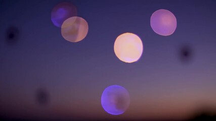 Poster - bokeh light circles against twilight sky, abstract photography concept