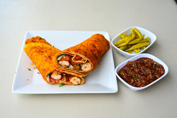 Wall Mural - Lavash doner kebab ( soslu kasarli zurna doner durum )  or shawarma sliced in plate isolated.  Tavuk Et Doner Durum. Hatay Iskenderun usulu bazuka tavuk doner durum. 