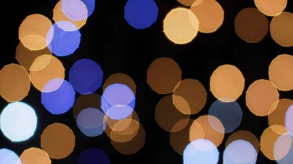 Poster - Blurred colorful bokeh lights on a dark background, abstract festive and vibrant atmosphere concept