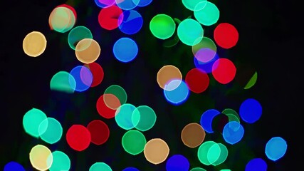 Poster - Colorful bokeh lights on a dark background, abstract photography. Festive and vibrant illumination concept