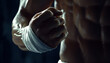 © Oleksiy - Close-up of athletic man with wrapped hands fists for boxing or martial arts training