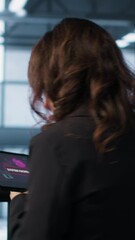 Poster - vertical video data center engineer stressed by cyberattack affecting devices, trying to protect cri