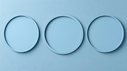 Poster - Three Light Blue Oval Frames Against a Blue Wall