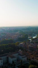 Wall Mural - Vertical video. Rome, Italy. Flight over the city. Panorama of the city in the morning. Backlight. Summer, Aerial View. Rich colors