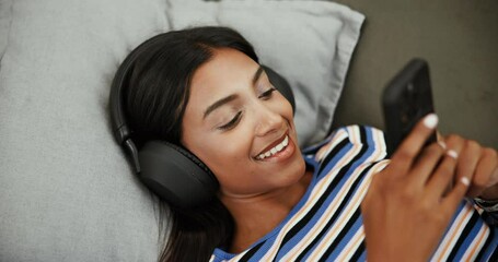 Aufkleber - Above, house and woman with smartphone, headphones and listening to music, audio and radio. Person, apartment and girl on couch, cellphone and headset with sound, comfort and relax in living room