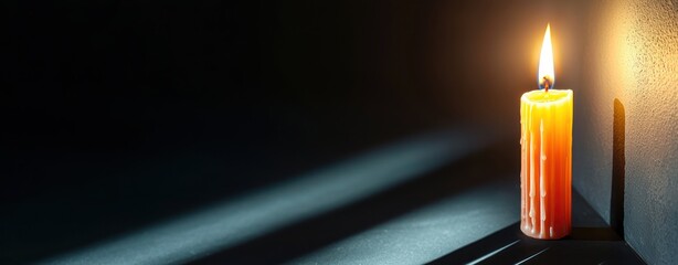 Poster - Warm Flickering Candle Light in Dark Room Creating Shadows and Soft Glow Atmosphere for Relaxation and Reflection