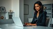 © RHMIND - 'Professional Businesswoman at Workplace in Modern Office Environment'