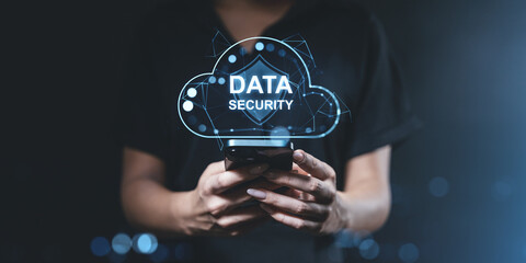Fototapete - Data security concept with a glowing cloud hologram over a smartphone.