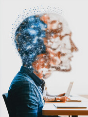 Poster - The Digital Mind: A silhouette of a person working at a laptop, with a stylized digital network overlaid on their head. representing the human brain and modern technology merging into a single entity.