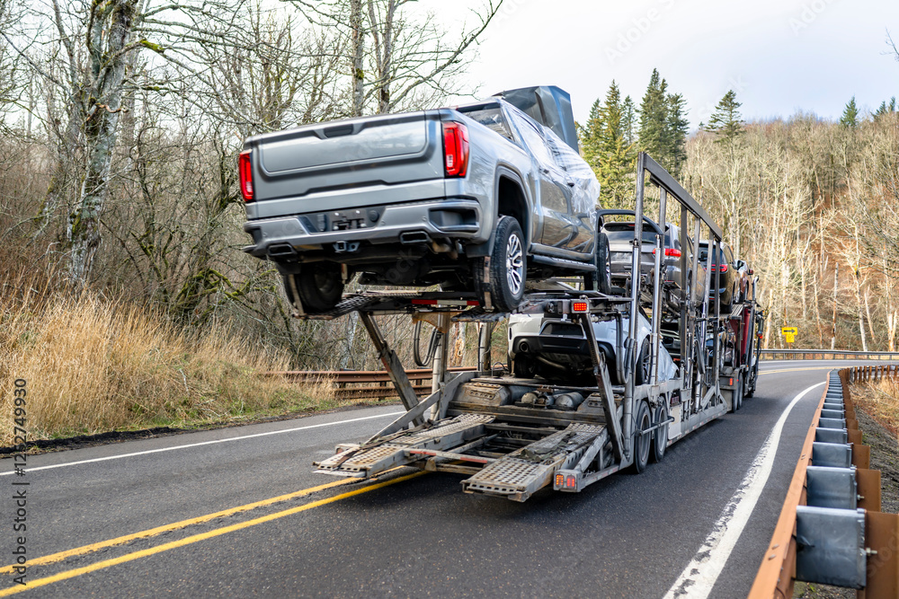Powerful car hauler big rig semi truck tractor transporting cars and ...