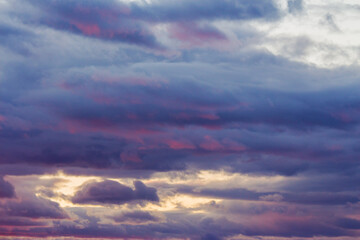 Wall Mural - clouds on the sky at twilight. spectacular imagination. beautiful nature background in colorful ligh