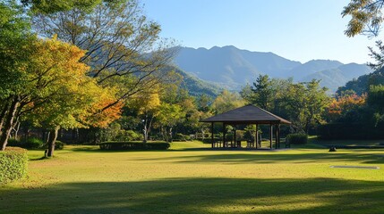 Wall Mural - Serene Autumn Park Gazebo with Mountain View