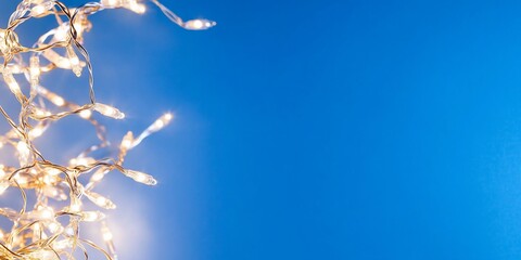 Canvas Print - Christmas Lights Against Blue Sky (1)