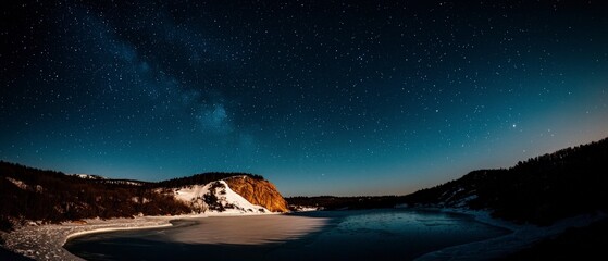 Starry Night Over Frozen Lake and Cliffs