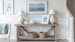 © Suresh Thangavel - A nautical-style entryway with a driftwood console table, seashell accents