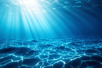 Aufkleber - Underwater scene with sunlight beams penetrating clear blue ocean water.