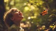 © Arthittaya - Child Discovering Butterfly in Nature