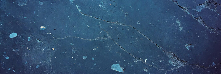 Poster - Deep navy blue cement wall texture against a light blue background for creative design needs