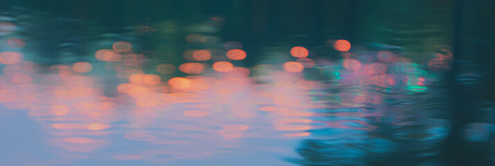 Aufkleber - Droplets capture a blurred forest landscape with soft tones and bright background