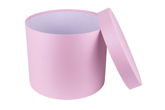 Round, pink gift box with a gross on a white background