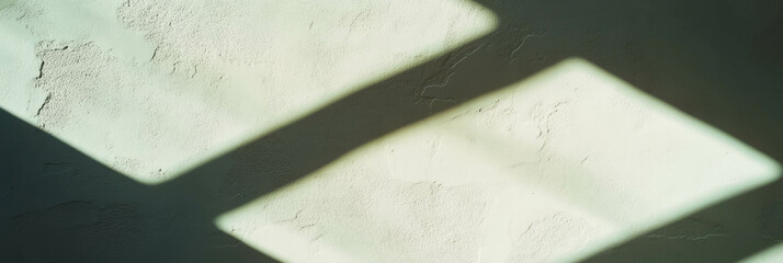 Poster - Rough textured Venetian plaster casting shadows in bright light on a banner background