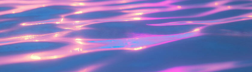 Poster - Waves recede along sandy shore creating vibrant patterns under bright sunlight