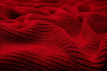 Wall Mural - Red sweater texture as a background.