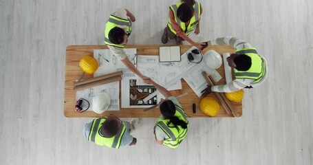 Poster - Top view, people and construction team with handshake, engineering and floor plan for house project. Employees, talk and collaboration on architecture design, greeting and introduction in office