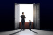 © Who is Danny - Businesspeople standing near giant open door with bright light, symbolizing decision-making or opportunity, in a dark background.