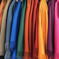 Poster - Assortment of scarves hung on a rack, great for fashion and lifestyle themes