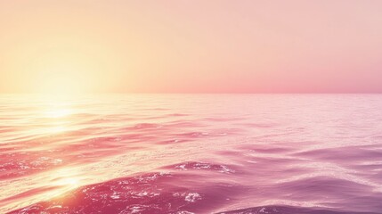 Wall Mural - calm pink ocean water reflecting the sunset sky above