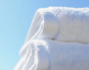 Aufkleber - Artistic Angle of Soft White Towels Captured in Natural Light Highlighting Their Fluffy Texture : Generative AI