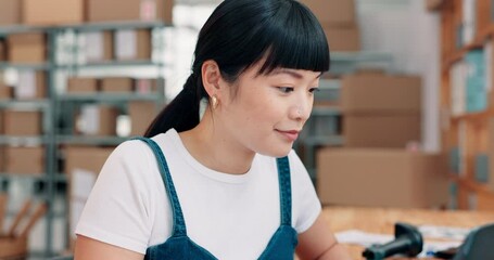 Leinwandbilder - Asian woman, laptop and typing with boxes for logistics, schedule delivery or email confirmation at warehouse. Female person, employee or distributor with smile on computer for online distribution